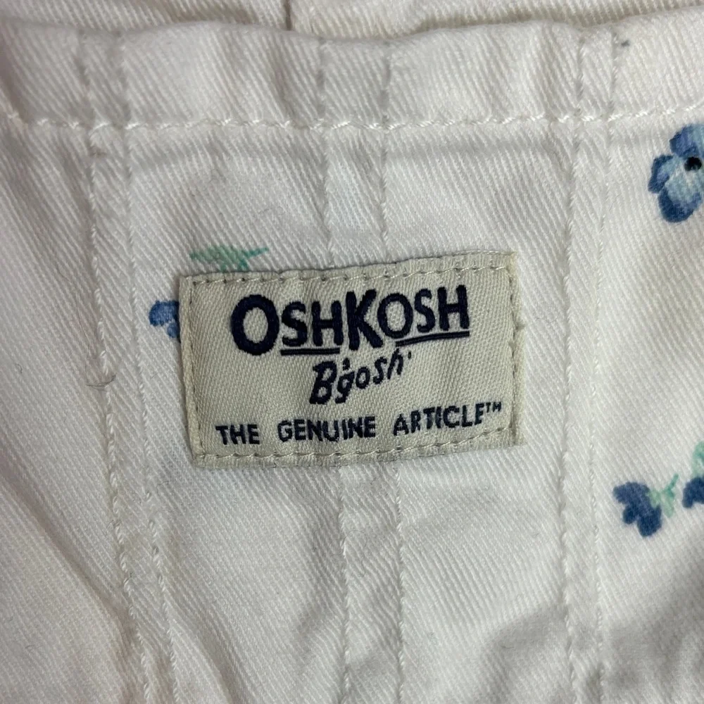 OshKosh B'gosh Ivory Overalls with Blue Floral Design